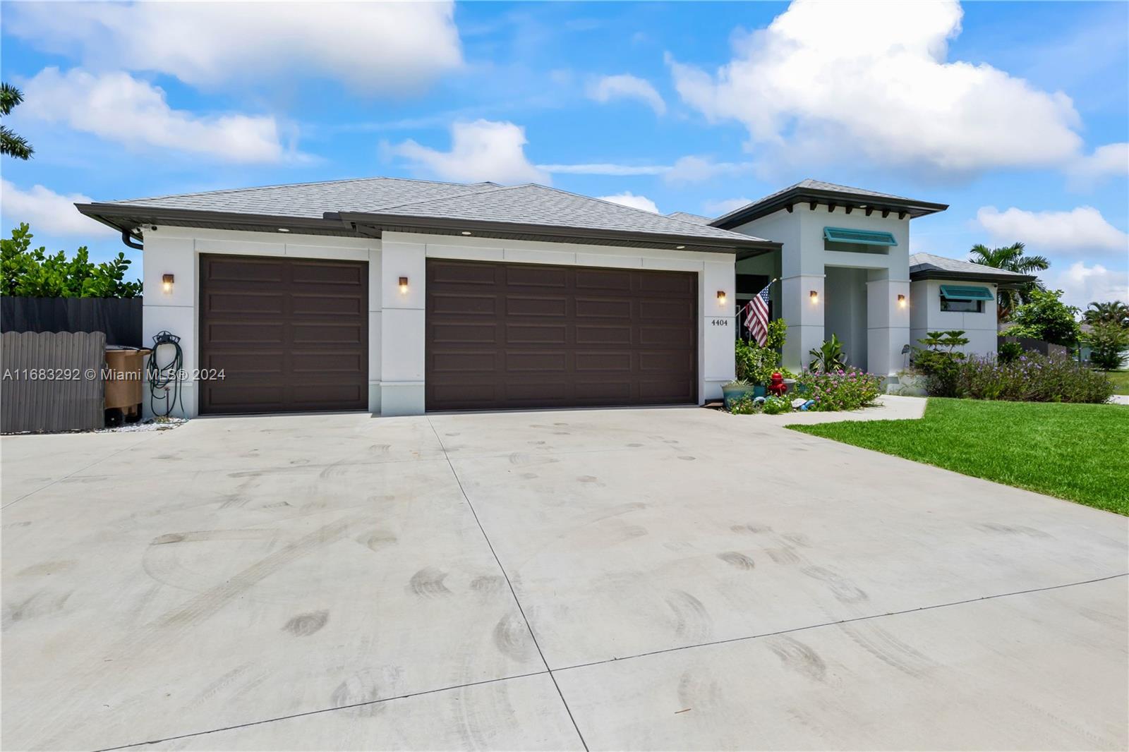 No hurricane flooding! This rare corner triple-lot property offers ample room for outdoor fun, sports, and more, with full fencing. Just two years old, the custom-built home features an open floor plan, split master suite, three bathrooms, and a spacious office with barn doors. The great room has 90° disappearing doors, ceramic tile, and abundant light. The chef’s kitchen includes high-end appliances, granite counters, and a large island. A three-car garage with a separated bay is ideal for a workshop. Enjoy the sparkling pool, spa, and ample entertaining space. Solar panels keep electric bills ultra-low at $25/month. Plus, a whole-house generator, pre-wiring for shutters, landscape lighting, and more are​​‌​​​​‌​‌​​​‌‌​​​‌‌‌​​‌​​‌‌​​​​ included!