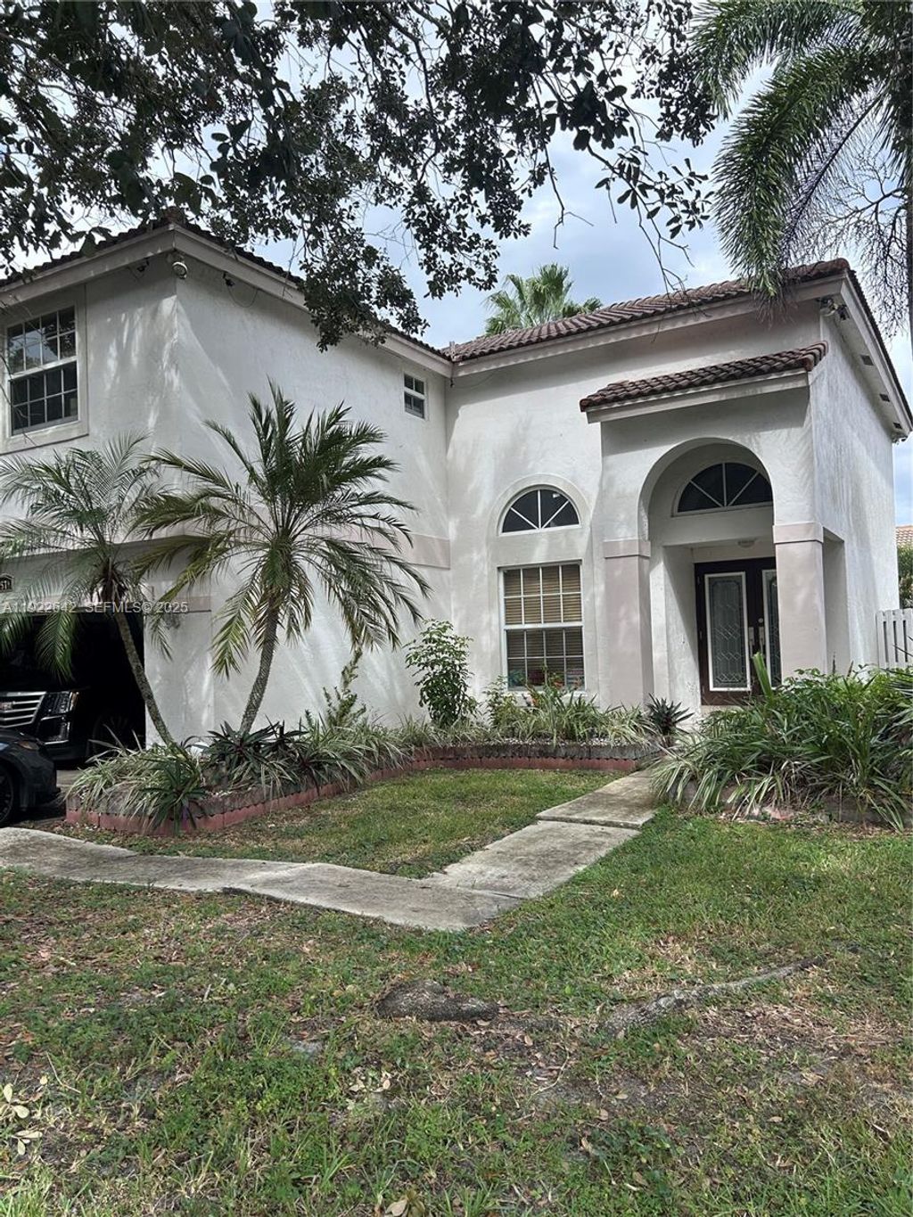 Photo of 12571 NW 10th St, Sunrise, FL 33323 (MLS # A11922642)