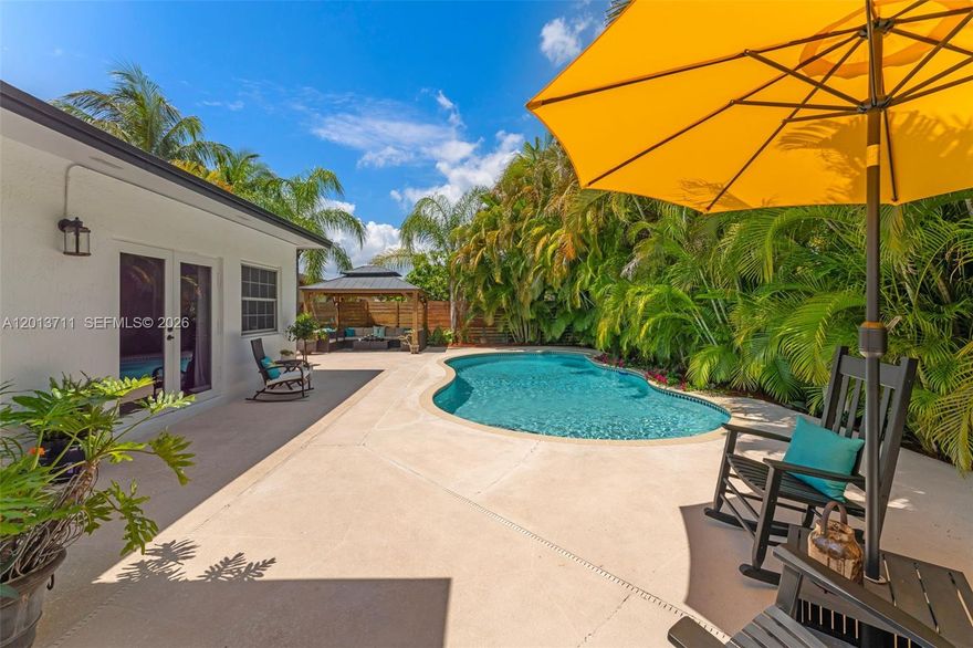 Welcome to 6651 SW 148 Ct, a light-filled and thoughtfully upgraded home in a prime West Kendall location known for its top-rated schools and convenient access to everything. This 3 bedroom + office residence features a brand new metal roof less than 1 year old, impact windows throughout, and a modern kitchen with stainless steel appliances and a spacious walk-in pantry. The layout flows seamlessly into an incredible backyard designed for entertaining, complete with a pool and a separate covered gazebo, plus side access with room for a boat or RV. The remodeled guest bath showcases an organic modern design with a live edge wood vanity and high-end porcelain tile finishes. The spacious primary suite offers a walk-in closet and a comfortable retreat feel, all complemented by bright, open living areas that make this home as functional as it is inviting. This is a turnkey opportunity in a highly desirable location close to top schools, parks, shopping, and major roadways.