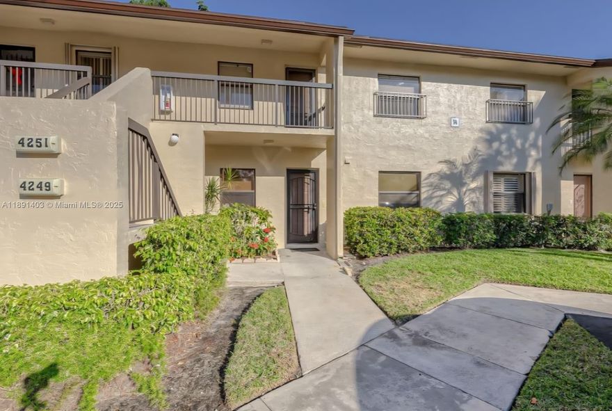 Tastefully updated ground floor corner unit offering 2 bedrooms and 2 bathrooms with peaceful canal views Bright open layout with tile flooring throughout spacious living and dining areas and sliding glass doors leading to a private screened patio surrounded by lush greenery The modern kitchen features white cabinetry quartz countertops stainless steel appliances and a breakfast bar perfect for casual dining The primary suite includes wood style flooring a walk in closet and a remodeled bathroom with walk in shower The guest bath is also renovated with elegant finishes Additional highlights include newer full size washer and dryer updated lighting and ample storage Quiet community with mature trees and convenient parking Excellent location near shopping dining parks and major highways.