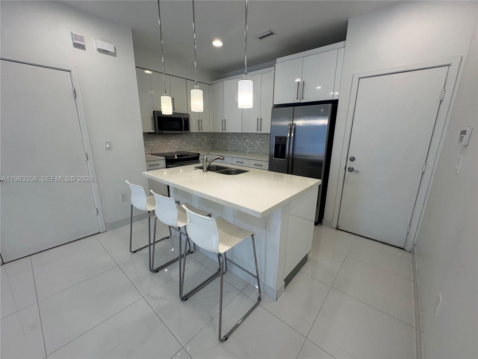 2630 NE 213 St 105