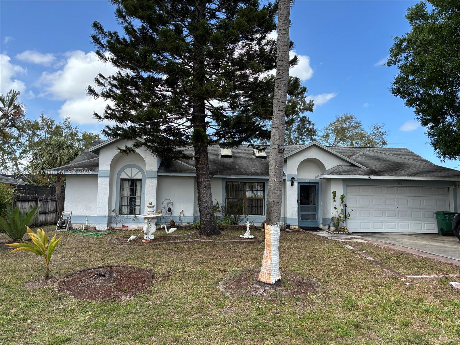 Discover the perfect starter home in a family-friendly community! This 3-bed, 2-bath single-family home offers incredible potential with 421 additional enclosed square feet, ideal for an in-law suite with 2 extra bedrooms and a bathroom—perfect for multi-generational living or rental income. The huge yard is a dream for pets, outdoor fun, or even a pool! Major updates have already been taken care of, including a **newer electric panel, AC, and water heater** for peace of mind. With motivated sellers ready to make a deal, this is a rare opportunity you don’t want to miss. Whether you’re a first-time buyer or a growing family, this home is priced to sell and won’t last! Act now before it’s gone!