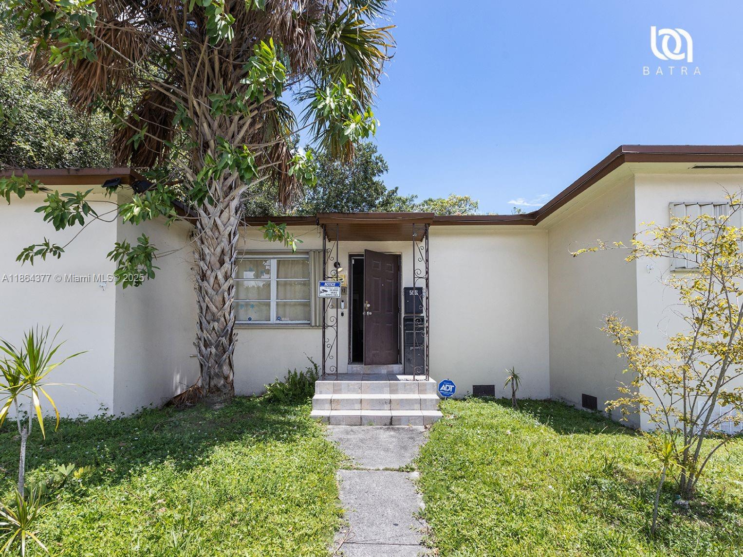 Beautifully remodeled 3BR/2BA corner-lot home in Miami’s Model City! Offering ~1,469 sq ft of living space on an 8,075 sq ft lot, this single-story residence features a modern kitchen with granite countertops, tile and hardwood floors, and an open layout. Roof was replaced with permits in 2009; hurricane shutters add value and peace of mind. Carport with driveway parking. Centrally located, minutes from Wynwood, Downtown, and major highways. A perfect blend of charm, comfort, and investment potential!