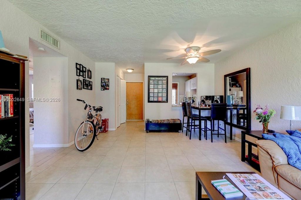 Photo of 610 SE 2nd Ave #L8, Deerfield Beach, FL 33441 (MLS # A12002649)