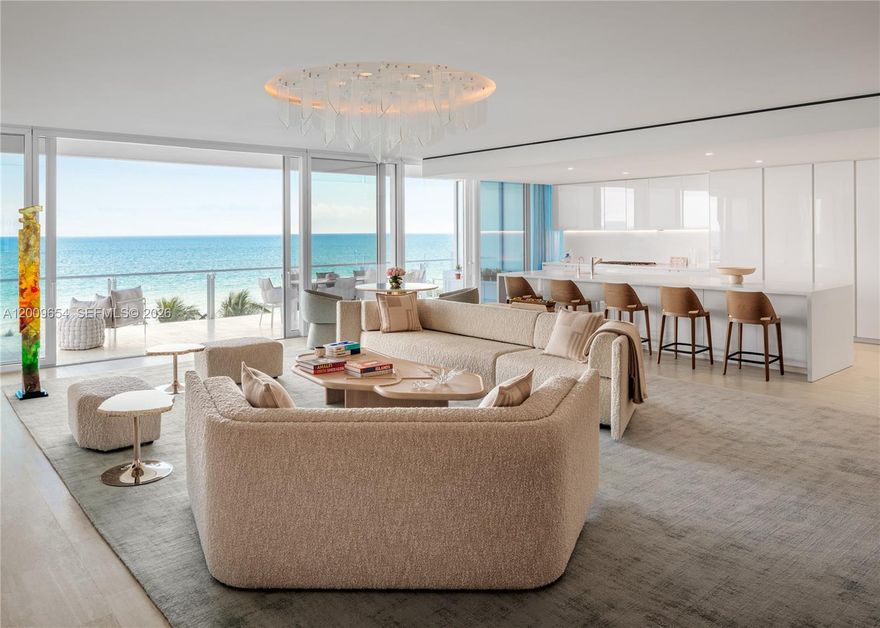 Step Inside With Me! A legendary oceanfront icon, The Surf Club, a storied address where heritage meets elegance. Interiors by an internationally acclaimed designer define North Tower Corner Residence 521 offered furnished with bespoke selections. Curved lime-plastered gallery walls, travertine flooring, and white oak detailing shape the oceanfront salon. Framed by walls of glass, the space is elevated by sculptural lighting and a statement travertine media wall that anchors the room with sophistication. The hosting experience is completed by a bright dining area, with a backlit onyx and marble bar. The gleaming gourmet kitchen offers an oversized eat-in island, lacquered Boffi cabinetry, Sub-Zero appliances, and ventilated Wolf cooktop. A soft, organic palette creates a serene ambiance across all 4 ocean-view suites. The oceanfront primary bedroom features a substantial white oak dressing room with spectacular millwork, spa-caliber bath with soaking tub, dual vanities, glass-enclosed shower, and Himalayan salt infrared sauna. The residence is further enhanced by a private elevator foyer, an ocean-facing den, carved marble powder bath, specialty pocket doors, and dedicated laundry/storage. An expansive 838 Sqft terrace showcases panoramic sunrise views from multiple sitting areas. Residents of the Surf Club appreciate access to world-class restaurants, full-service spa, multiple gyms, beach & pool service, and the revered hospitality synonymous with the Four Seasons name.