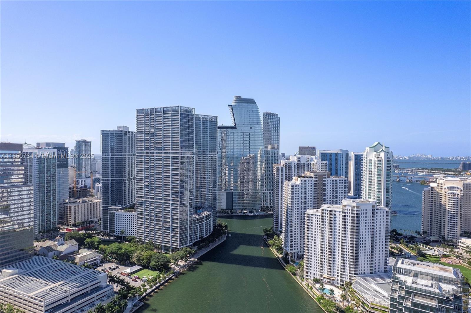 Aston Martin Residences Miami is a luxury residential tower located at 300 Biscayne Boulevard Way. Developed by G and G Business Developments, this 65-story skyscraper features 391 high-end condominiums with designs inspired by the iconic Aston Martin brand. Residences offer expansive layouts, floor-to-ceiling windows, and top-tier finishes. Amenities include a private marina, a state-of-the-art 2 floor wellness center, a sky deck with a pool, and more. The building’s sleek, modern design and prime waterfront location make it a prestigious address in Miami’s vibrant downtown area.