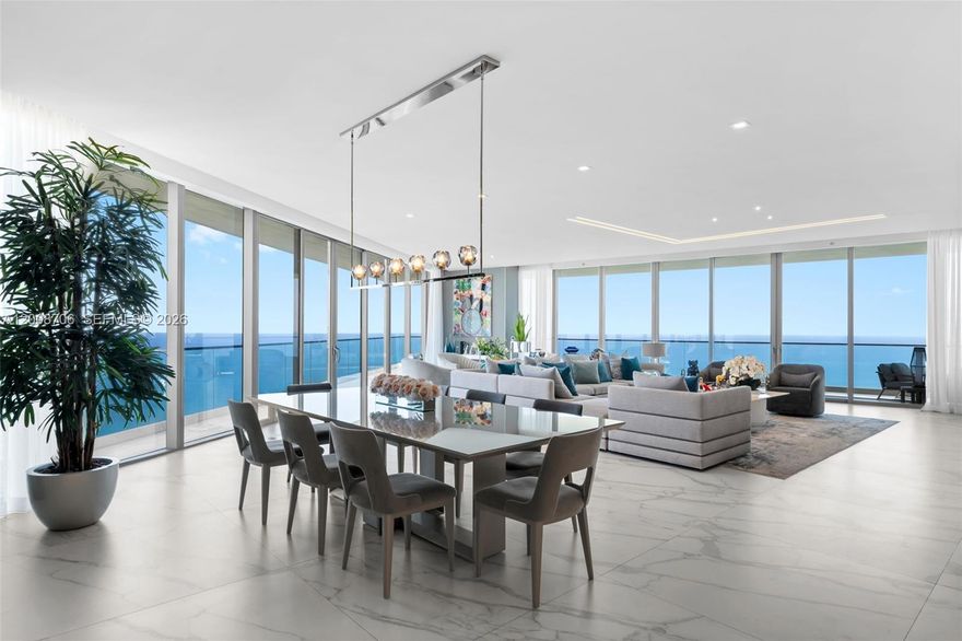 Introducing unparalleled oceanfront living at Residence 5200 in the iconic Armani Casa Residences Sunny Isles Beach, a world-class tower designed by Giorgio Armani in collaboration with César Pelli. This high-floor residence offers expansive living spaces framed by floor-to-ceiling glass and sweeping views of the Atlantic, Intracoastal Waterway, and city skyline.
A private elevator entry opens to ultra-refined interiors featuring custom European finishes, elegant stone flooring and a thoughtfully designed open layout ideal for both everyday living and entertaining. The chef’s kitchen exceptionally appointed with sleek cabinetry and a spacious island, seamlessly connecting to formal living and dining areas that extend onto oversized terraces - with direct oceanfront vistas.
The dream-like ocean views continue in the primary suite with a generous walk-in closet and a spa-inspired bath, soaking tub, and glass-enclosed shower. Additional bedroom suites offer comfort, privacy, and flexible use for guests or office space.
Residents enjoy access to over 35,000 square feet of curated amenities, oceanfront pools, private beach service, spa and wellness facilities, fitness center, restaurant/coffee bar, concierge, and 24-hour security.
Ideally located in the heart of Sunny Isles Beach, moments from Bal Harbour Shops, fine dining, and international airports, Residence 5200 presents a rare opportunity to own within one of South Florida’s most prestigious branded residences.