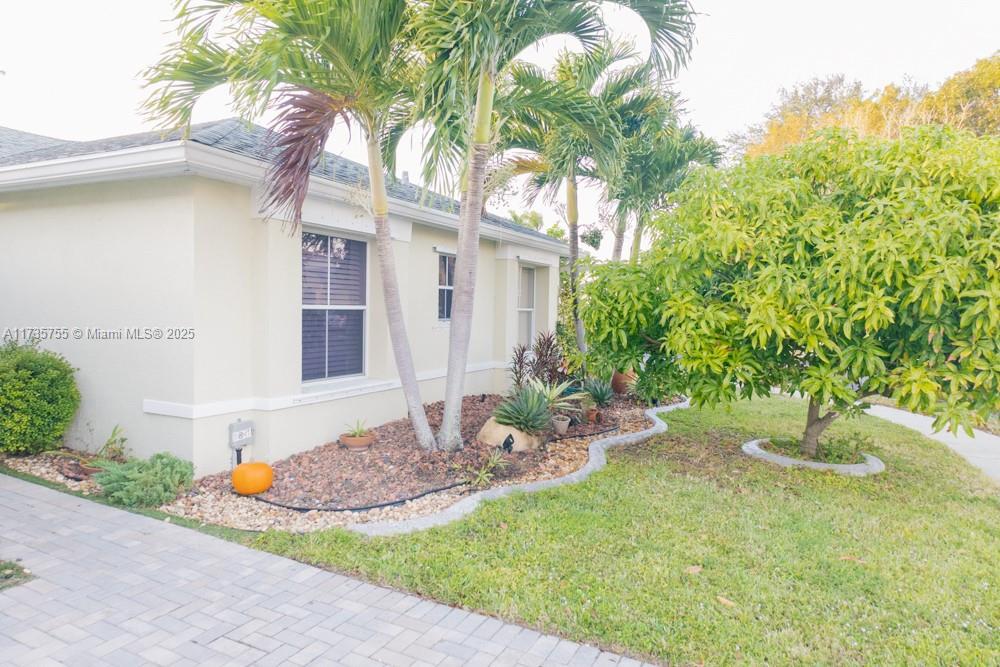 This beautifully updated 4-bed, 2-bath home in desirable Country Creek Estates offers 2,144 sq. ft. of airy living space with vaulted ceilings, a remodeled kitchen with stainless steel Samsung appliances, updated bathrooms, and a large screened patio. Nestled in a biking, community with a low $110/month HOA covering lawn care, pool, and playground. Features a split floor plan, spacious driveway (fits 3-4 cars), 2-car garage with storage, and ample attic space. Near top-rated schools, major highways, and amenities like Publix, Walmart, and Home Depot, plus diverse dining and shopping options. A perfect blend of comfort, convenience, and value! Vaulted Ceilings Samsung Stainless steel appliances Very low HOA $110 Hurricane Shutters Huge enclosed patio (host 30p) Washer/Dryer