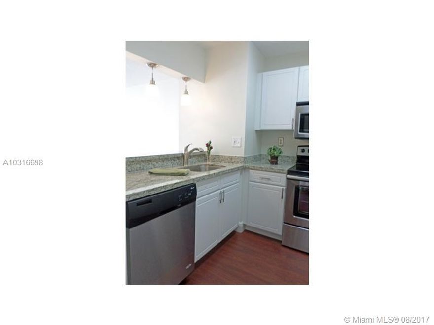 Remodeled Corner unit with great natural light.  This PH unit is a must see!  Beautiful white wood cabinets, granite counter tops, SS appliances and huge pantry.  Darker wood floors in living area and bedroom.  Balcony with partial city views.  Newer bathroom, spacious bedroom.  Building offers secured gated community, parking, swimming pool, basketball courts, volleyball court, BBQ area, remodeled lobby, fitness center and laundry facilities.