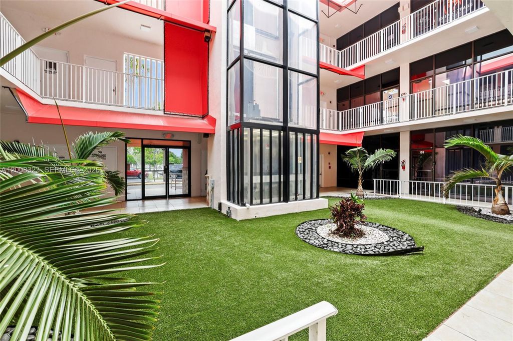 Photo of 8358 W Oakland Park Blvd #202-F, Sunrise, FL 33351 (MLS # A12008323)