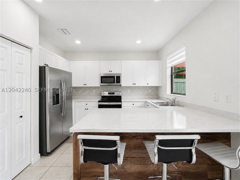 Tiny photo for 10604 W 33rd Ln, Hialeah, FL 33018 (MLS # A12042240)