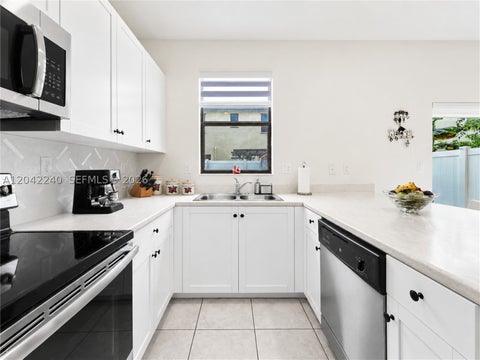 Tiny photo for 10604 W 33rd Ln, Hialeah, FL 33018 (MLS # A12042240)