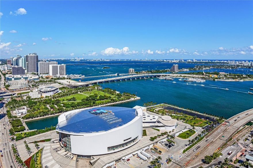 STUNNING NEW BUILDING WITH UNOBSTRUCTED DIRECT BAYVIEWS Furnished, 9-ft ceiling with floor-to-ceiling windows, balcony with dazzling views, porcelain tiles, washer/dryer custom Italian kitchen. smart keyless entry, smart thermostat, glass-enclosed showers, matte black kitchen, and fully built-out California-style closets. amenities, including a lobby with cocktail bar and restaurant over 19,000 square foot double-height amenity deck overlooking Downtown Miami and Biscayne Bay, curated art and green walls throughout all common areas, 132-foot resort-style pool with private lounge areas, 16-foot-long poolside screening LED wall, sky entertainment lounge and grilling terrace featuring eight grills, two-level co-working Lab featuring 11 reservable conference rooms, and a coffee lounge