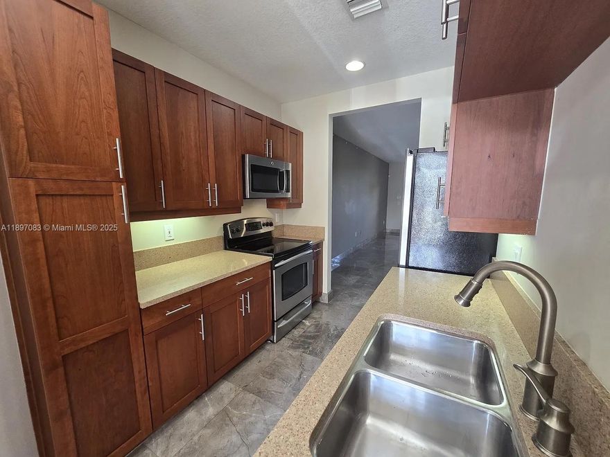 Charming 1-bedroom, 1-bath unit located in the desirable Sailboat Bend neighborhood! This home features tile floors throughout, a spacious living room, and a beautifully updated kitchen with brand-new appliances. Enjoy the convenience of your own assigned parking space and an unbeatable location just minutes from Las Olas Boulevard’s shops, dining, and entertainment. Easy access to I-95 makes commuting a breeze—perfect for anyone looking to enjoy the best of Fort Lauderdale living!