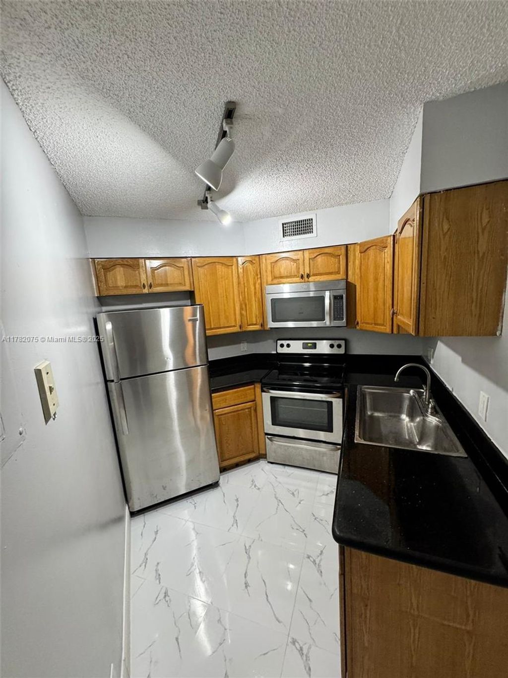 Photo of 215 Lake Pointe Dr #214, Oakland Park, FL 33309 (MLS # A11782075)