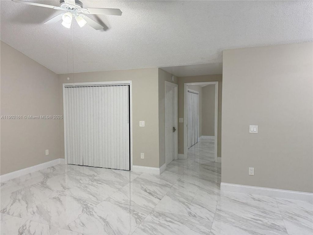 Photo of 5416 Eagle Lake Dr #4, Palm Beach Gardens, FL 33418 (MLS # A11902161)