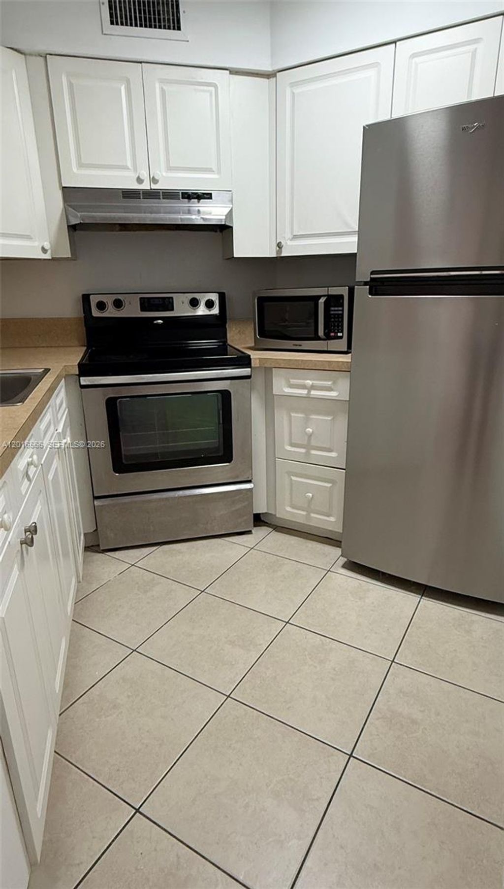 Photo of 216 Lake Pointe Dr #223, Oakland Park, FL 33309 (MLS # A12016566)