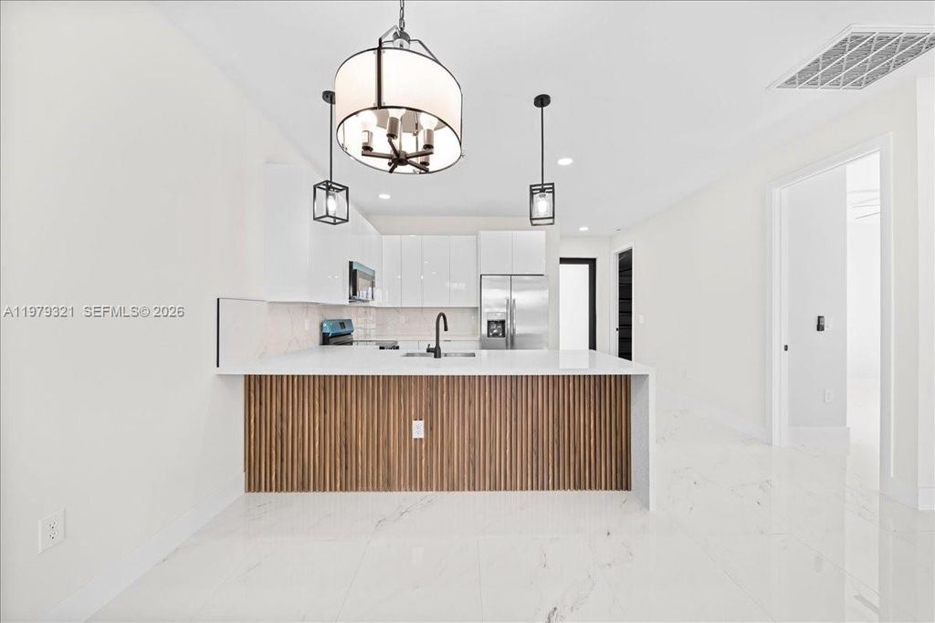 Photo of 1315/1317 Diplomat Pkwy E Pkwy, Cape Coral, FL 33909 (MLS # A11979321)