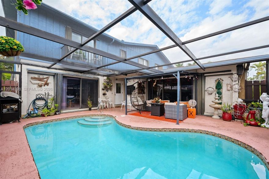 First look at this fabulous and unique town home located in the Country, Green Acres/Lake Worth, FL. This home has a lot to offer, downstairs living room can be a third bedroom, just add a closet and wall to make it a huge main bedroom. High ceilings and marble floors in the spacious family and dining room space. Lots of windows adding light to all rooms. Separate pantry/storage off the kitchen also houses the laundry room. Two large bedrooms with lots of closets and a full bath finish off the second floor. The piece-de-resistance is the private courtyard pool area, fully screened in to enjoy the outside all year long.  Imagine relaxing by the pool, soaking up the Florida sunshine, or entertaining guests in a space designed for both comfort and style. This home is perfect for those who value convenience and leisure, providing a serene retreat from the hustle and bustle of everyday life. Close to shopping, local restaurants and schools; easy access to I95 and FL Turnpike. You won't find a place like this one! Showings by appointment only! Make one today and don't miss this gem. Come, See, and Stay!