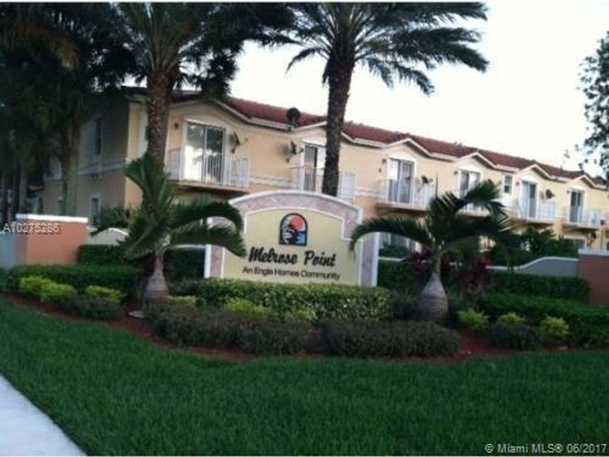 Beautiful 2/2.5 condo/townhouse in the gated and coveted development of Melrose Point. Freshly painted, wood looking ceramic floors. Bedrooms have own bathroom and walk-in closets, ½ bath downstairs. Washer and dryer on second floor. Kitchen has granite counter tops, extra cabinets and counter-tops plus an extra eating counter in dinning area. 1 assigned parking space and plenty of guest parking. Community club house, gym and pool.