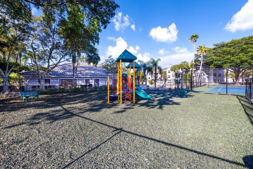 Photo of 11225 W Atlantic Blvd #204, Coral Springs, FL 33071 (MLS # A11935265)