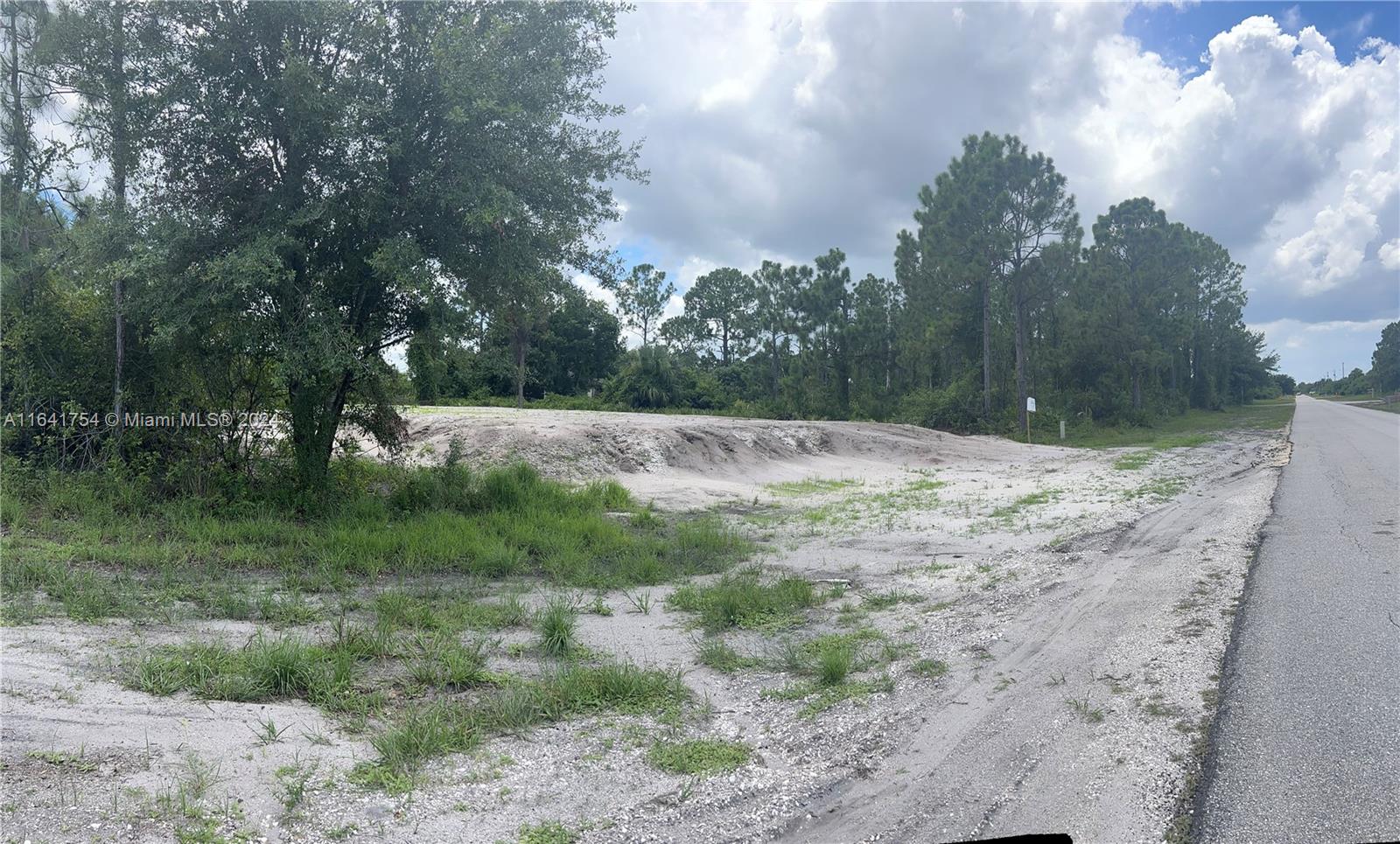 Located in a highly desirable area, this generous 0.23 acre corner lot offers an excellent opportunity to design your dream home. The lot has been completely cleared and filled, and is now ready for construction. Plans are currently in the approval process with the city. It provides convenient access to shopping and dining options, and you will enjoy the quiet atmosphere of a well-established neighborhood.