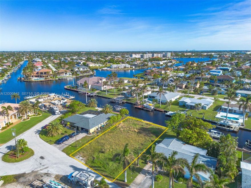 PRICED TO SELL | Direct Gulf Access | No Bridges | Yacht Club Area! Don’t miss this rare chance to own a boater’s paradise in one of Cape Coral’s most desirable neighborhoods. This 0.23-acre waterfront lot sits on a quiet cul-de-sac with 80 ft of canal frontage, seawall and concrete dock already in place, and all utilities available, assessments paid. Residential zone, ready for your custom dream home and pool. Open water is minutes away with NO bridges. Cape Coral Beach, top restaurants, and shopping all nearby. Your dream waterfront lot is one call away!