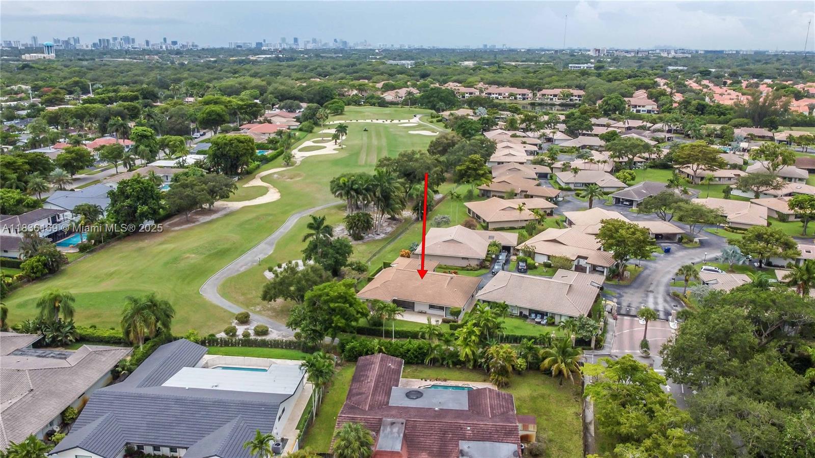 Beautifully updated 3 bed, 3 bath corner unit in a gated, private community with peaceful golf course views and no rear neighbors. This bright and spacious home features vaulted ceilings, crown molding, recessed lighting, and custom interior doors. Enjoy a custom kitchen with quartz countertops, stainless steel appliances, farmer’s sink, and ample cabinetry. Two primary suites offer flexibility and comfort. Impact windows and doors, plus hurricane shutters, provide peace of mind. Extras include a 1-car carport, wired surround sound and alarm system, tankless water heater (2024), 5-ton A/C (approx. 8 yrs), and newer tile roof (approx. 2 yrs). Laundry room with butler’s pantry adds function. Relax on your tumbled marble patio or at the community pool. A rare find!
