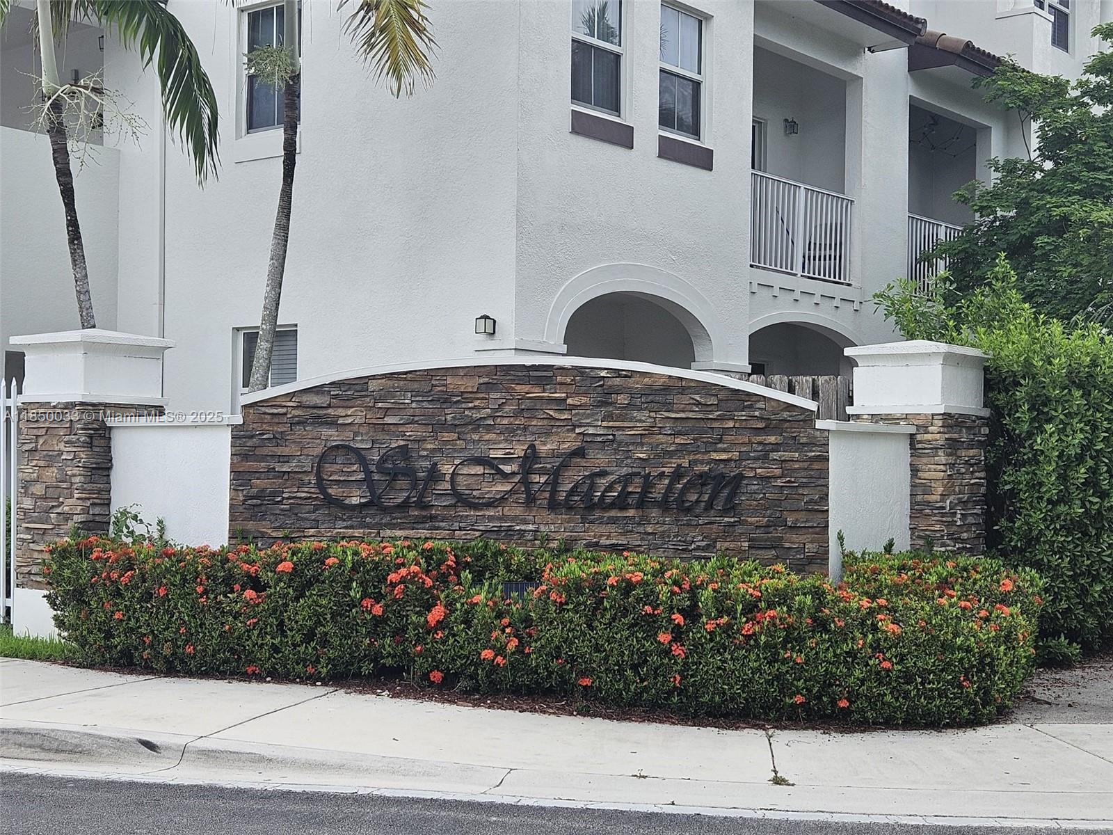 Beautiful Gate Community Aptm in the St. Maarten Complex – Exclusive Doral Location. Spacious two-story unit featuring an open-concept kitchen, dining, and living area on the first floor, along with a convenient guest half-bathroom. Upstairs, you'll find two bedrooms, each with its own en-suite bathroom. In-unit laundry and two assigned parking spaces included. Enjoy access to The Grand Bay at Doral Clubhouse, offering resort-style amenities such as a gym, pool, spa, children’s play area, clubhouse, and much more to explore, all incluided in the rental payment. The community also features 24-hour security and maintenance. Easy to show – Available immediately.