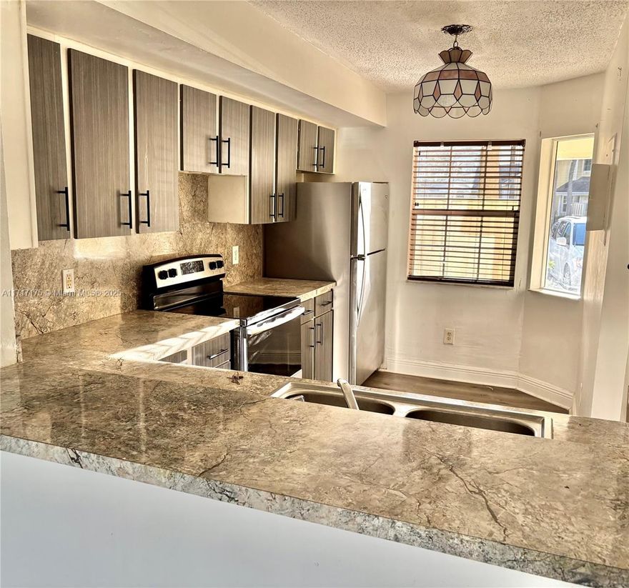 Beautiful Updated townhouse with lake view, 2Bedrooms, 2 1/2 baths, new kitchen cabinets & countertops, NEW stainless steel range, refrigerator & dish washer, walls painted, bathroom vanity has been update, MINUTES FROM THE TURNPIKE AND SAWGRASS, CLOSE TO SHOPPING, BUS ROUTE & SCHOOLS. WASHER/DRYER IN THE UNIT, WALK-IN CLOSET IN MASTER BEDROOM. VERY ATTRACTIVE COMMUNITY WITH POOL AND AMENITIES ,  2 external storages, VERY LOW HOA $253, 2 external storages. Please text me for questions, comp and showing.