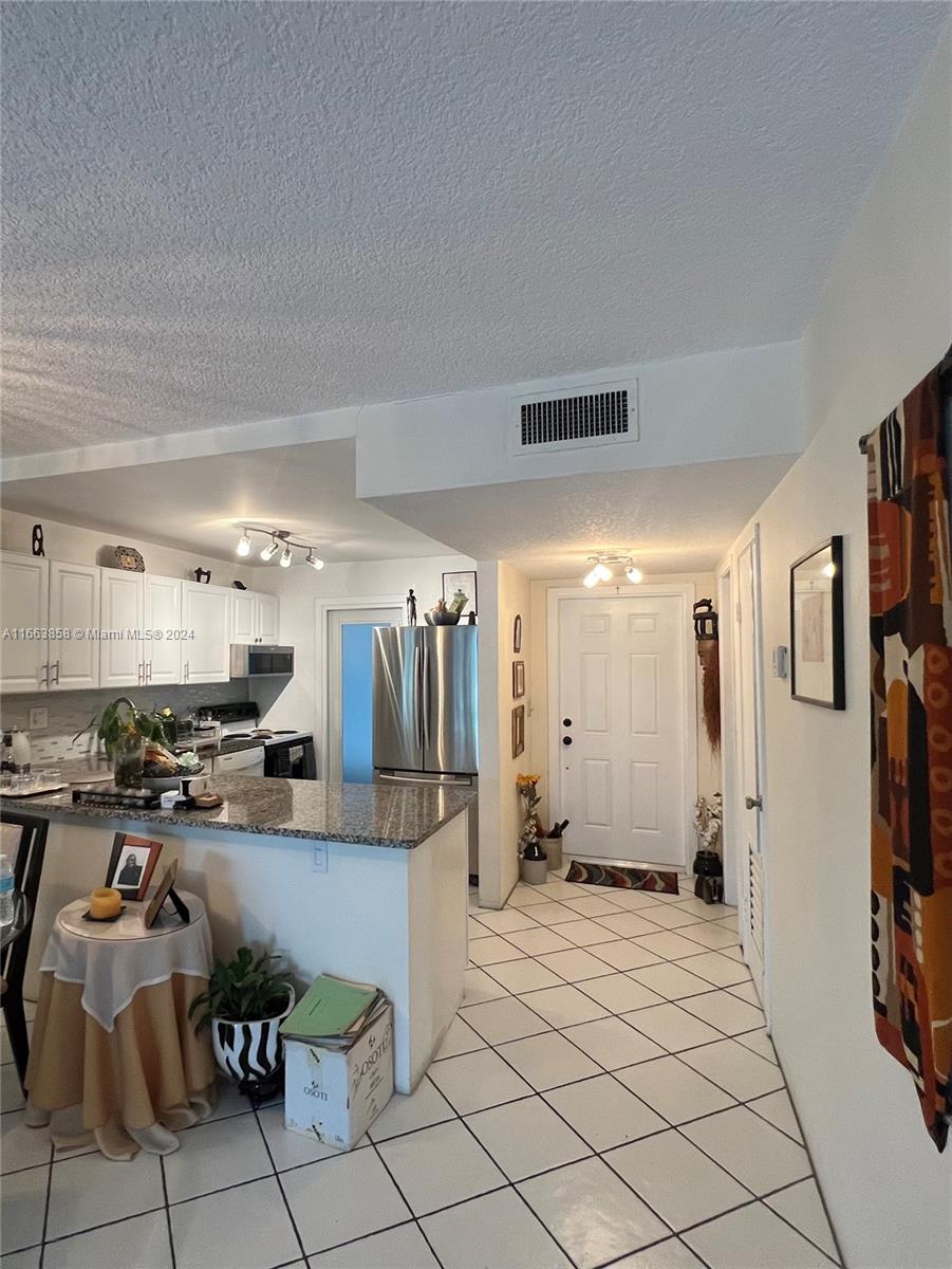 Welcome to this charming 1 bedroom, 1.5 bathroom condo located in a serene 55+ community in Hollywood, FL. This spacious unit offers beautiful views of the pool and parking, making it as convenient as it is picturesque. Equipped with hurricane impact windows for added safety, this home is move-in ready. The community provides a vibrant, active lifestyle with a variety of amenities to enjoy. Whether you're seeking a seasonal retreat or a permanent home, this condo is a fantastic opportunity to experience the best of South Florida living. Don’t miss out!"