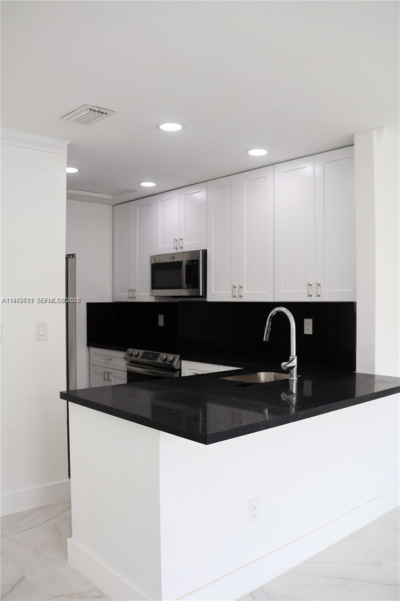 LAGO GRANDE TWO CONDO - Residential Lease