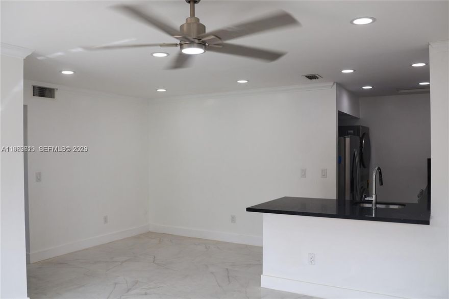 Beautiful Unit! COMPLETELY REMODELED two-bedroom two-bathroom, with new white wood cabinets, black quartz countertops, and new appliances. Bathrooms have been renovated with new vanities and new light fixtures. porcelain floors all. One assigned parking space. Can park up to 2 vehicles (using guest parking). Laundry inside the unit, a gated community, Clubhouse, Community Pool, Maintained Community, Management On Site.