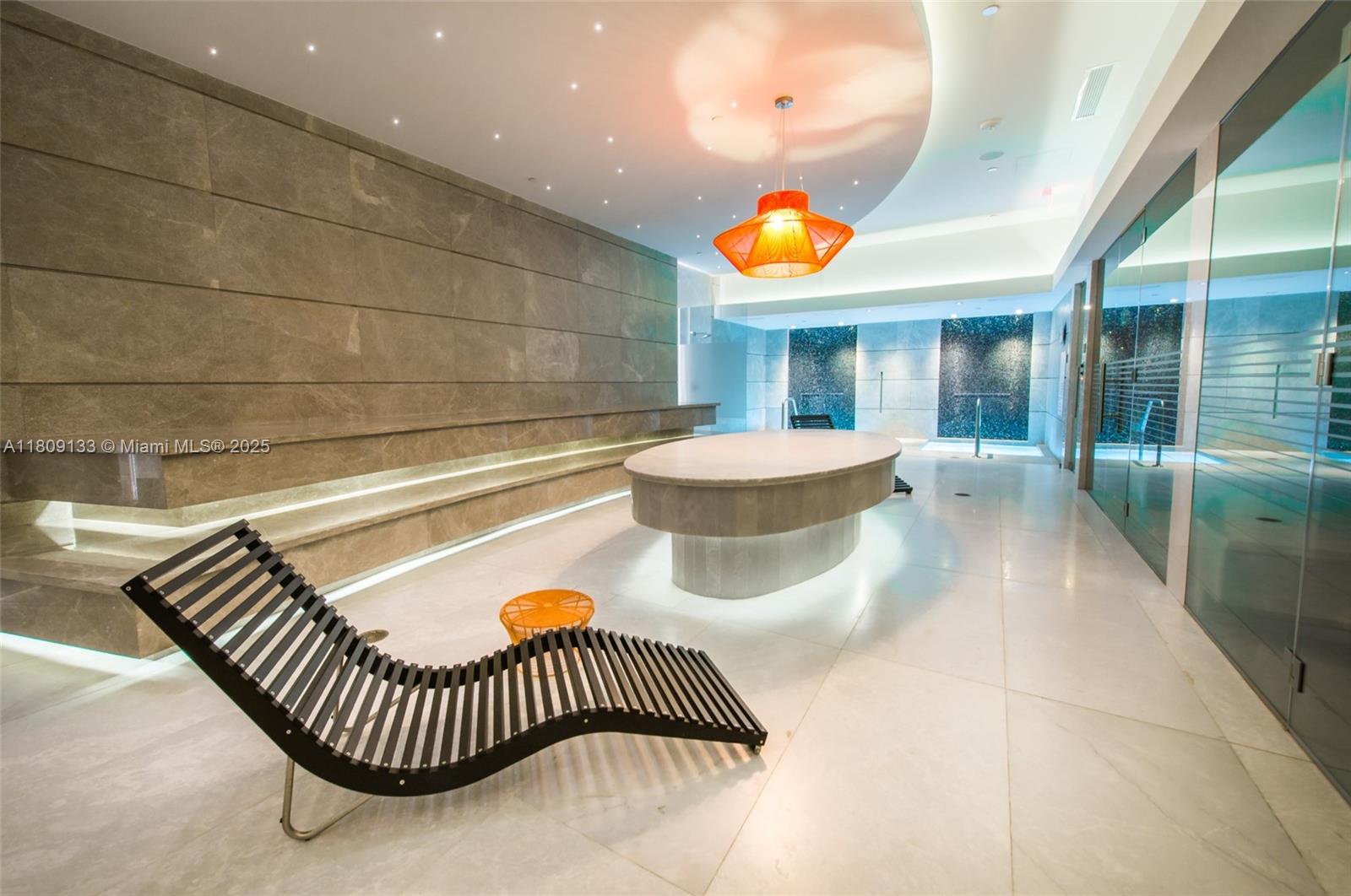 Spectacular upgraded studio at the iconic 1010 Brickell Condo. Unit features: Stone-like porcelain tile floor, glass-enclosed shower, built-out closet, window treatments, 9-foot ceiling heights, top of the line Smeg appliances, 1 pkng & 1 STORAGE SPACE! Live & play in this luxury building that offers: outdoor movie theatre, restaurant & swimming pool at 50th floor roof top; Co-ed Hammam spa w cold & hot Jacuzzi, massage & treatments rooms, sauna & steam room at 12th floor; basketball & racquetball courts, running track, indoor heated swimming pool, fitness center, party room w kitchen, open terrace & barbeque, kids room w bowling, virtual golf simulator, ping-pong, among others. Excellent location next to public transportation, Brickell City Centre, & more.