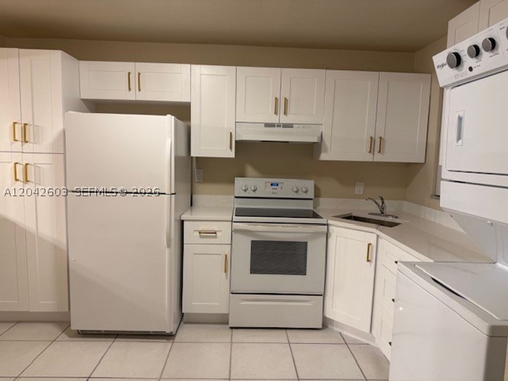 Photo of 3760 NW 115th Way #10-2, Coral Springs, FL 33065 (MLS # A12042603)