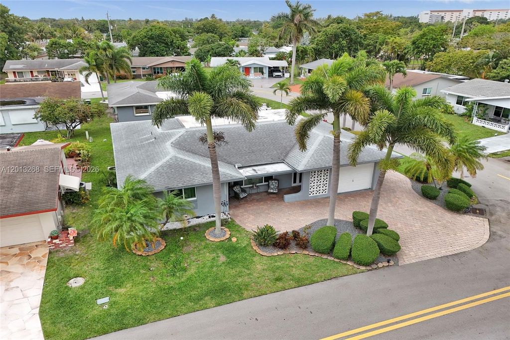 Photo of 4722 NW 44th Ct, Tamarac, FL 33319 (MLS # A12013268)
