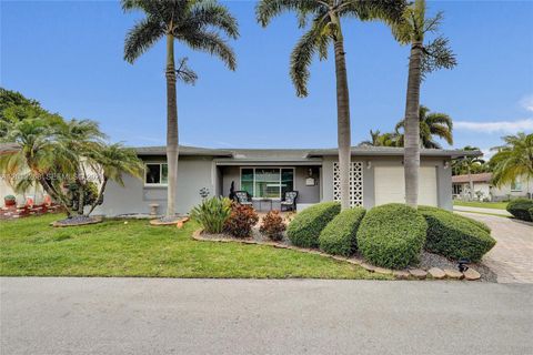 Photo of 4722 NW 44th Ct, Tamarac, FL 33319 (MLS # A12013268)