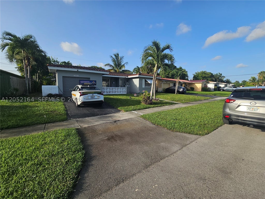 Photo of 3591 NW 23rd Ct, Lauderdale Lakes, FL 33311 (MLS # A12052164)