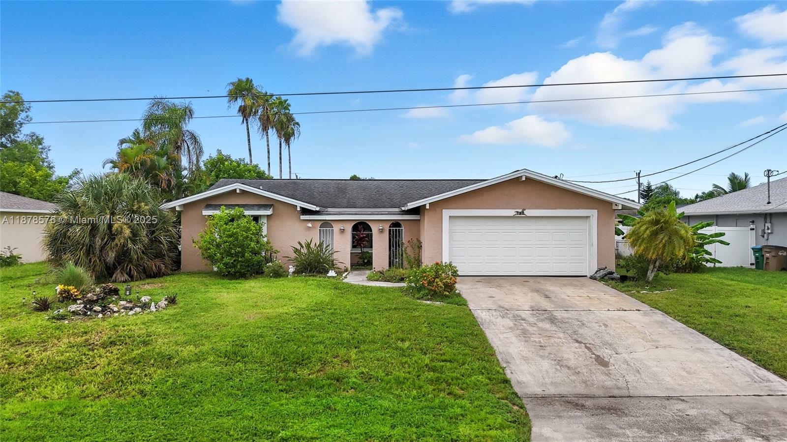 POOL HOUSE with 2 OWNER'S SUITES ON CITY WATER + SEWER, CENTRAL LOCATION, 1 MIN TO CAPE CORAL HOSPITAL. Spacious 4-bedroom, 3-bathroom pool home! This property is all about location and potential. With a little TLC you will have the house of your dreams! Inside, you’ll find an open layout filled with natural light, kitchen with stainless steel appliances, and plenty of cabinet space. Some of the upgrades include: hurricane impact garage door, impact windows, and a 7-yr old roof, brand new AC and new water heater for peace of mind. Create your beautiful oasis in the back yard (pool is in working condition) needs some maintenance, backyard is spacious and fully fenced with a variety of fruit trees for your enjoyment! No HOA fees and not in a flood zone! SELLER CONCESSIONS BEING OFFERED!