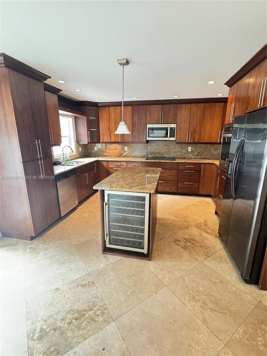 FAST APPROVAL and beautiful Townhouse, BEAUTIFUL kitchen cabinet, Nice Island with wine fridge,stainless steel appliances, washer and Dryer new granite counter tops, beautiful marble, floors on the first floor, wooden floors on the second floor.Impact windows, renovated bathrooms, new paint, fenced backyard. a few minutes from Promenade at Coconut Creek exellent location Ready to move in! It will not last long Bring your offers. FAST APPROVAL