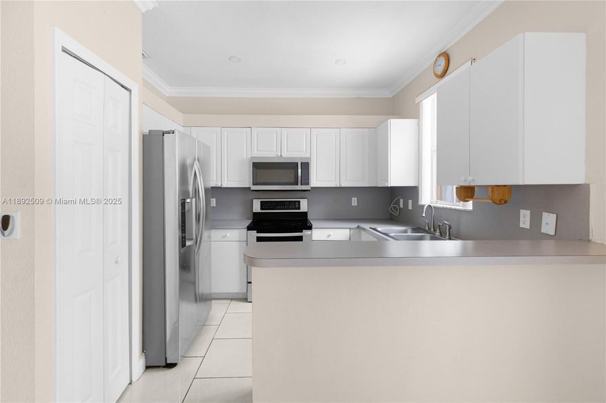 Welcome to your stylish retreat in Kendall Breeze South! This centrally located 3-bedroom, 2.5-bathroom
townhome offers a thoughtfully designed living space, complete with a versatile den on the first floor, perfect for a
home office or guest suite. Step into a bright, main-level highlighted by durable tile flooring, and enjoy modern
convenience with a full suite of appliances (A/C, Washer and Dryer, and Refrigerator with less than a year of use).
Retreat upstairs to three spacious bedrooms, including a tranquil primary suite featuring generous closet space and
an en-suite bath. An additional hall bath and half bath downstairs add both privacy and comfort. Easy access to the
874 and Turnpike for swift travel across Miami. Walkable to retail, dining, parks, and public transit.