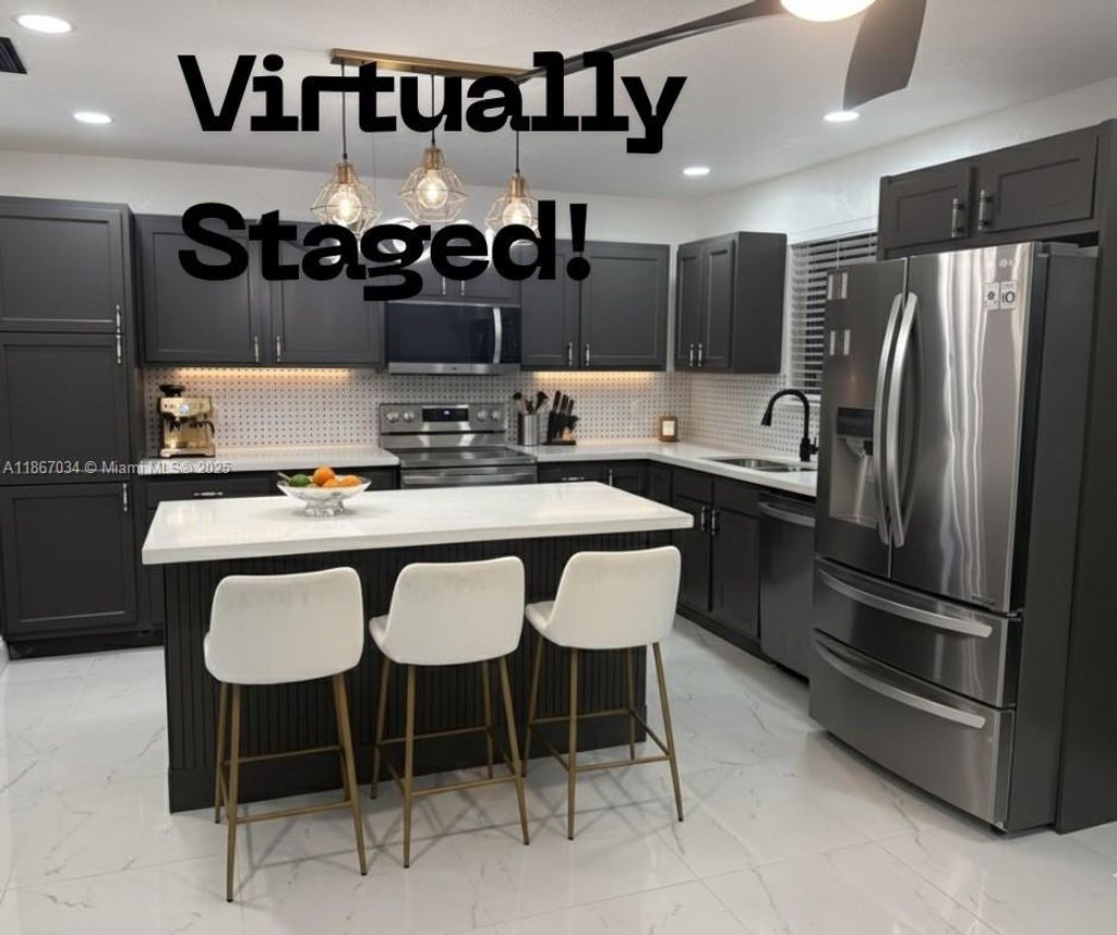 Photo of 4661 NW 4th St #1, Plantation, FL 33317 (MLS # A11867034)