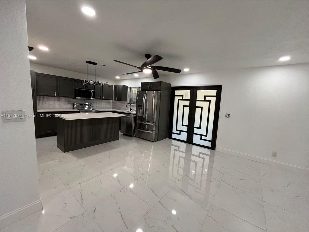 Photo of 4661 NW 4th St #1, Plantation, FL 33317 (MLS # A11867034)