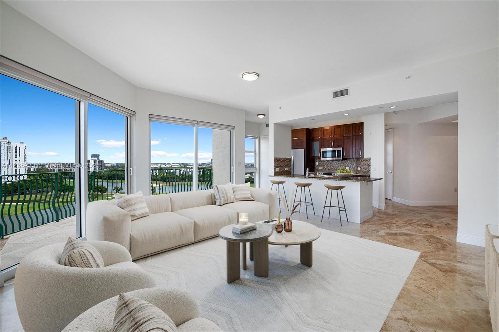 Stunning Tower Suite in Turnberry Village North with breathtaking golf course, lake, and skyline views from the 15th floor! This rare corner unit features high ceilings, floor-to-ceiling impact windows and doors, and a spacious terrace with southwest exposure—perfect for enjoying sunsets and endless city views. Offering just over 1,300 SF of elegant living space with marble floors throughout. Featuring 2 deeded parking spaces and a private storage unit on the same floor. Ideally located in the heart of Aventura on prestigious East Country Club Dr. HOA fee includes North Tower and Master Association.