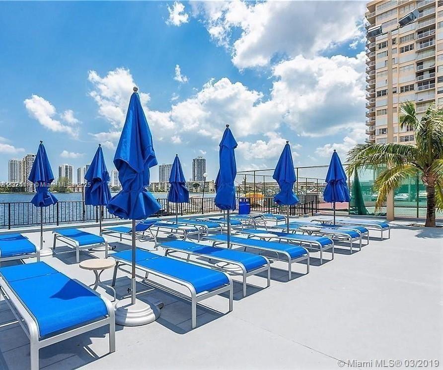 Spacious 2-bedroom, 2-bathroom condo in the heart of Aventura! This bright and airy unit at 2750 NE 183rd St, Unit 1203, features an open floor plan, a modern kitchen, and stunning views. New balcony featuring hurricane-impact resistant doors for safety and peace of mind. Enjoy resort-style amenities, including 2 pools by the water with spectacular views, a fitness center, and secure building access. Ideal location near shopping, dining, and major highways. Perfect for first-time buyers or investors. Don’t miss this opportunity! Open Floor Plan with Natural Light, Updated Kitchen & Appliances, Building Amenities: Pool, Gym, Security, Convenient Location in Aventura, ask an agent for the Video