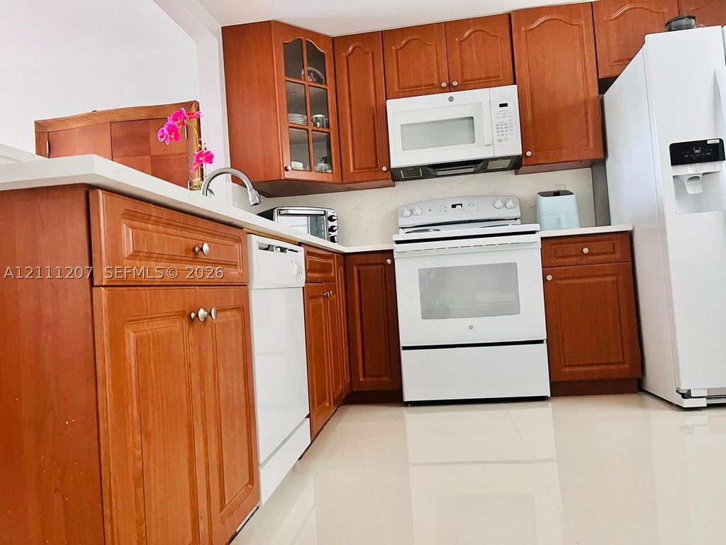Photo of 3955 N Nob Hill Rd #508, Sunrise, FL 33351 (MLS # A12111207)