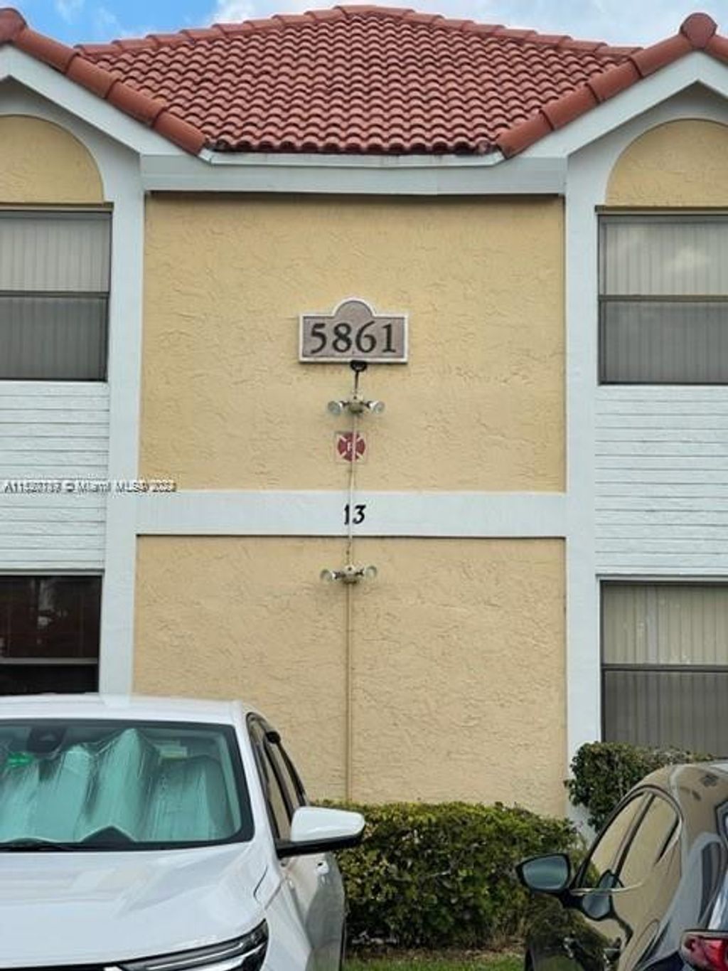 Photo of 5861 Riverside Dr #204A2, Coral Springs, FL 33067 (MLS # A11520189)