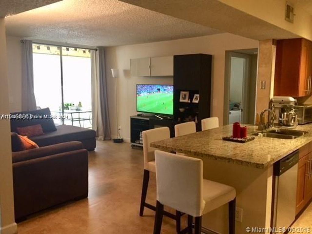 Photo of 4015 W Mcnab Rd #D105, Pompano Beach, FL 33069 (MLS # A11642367)