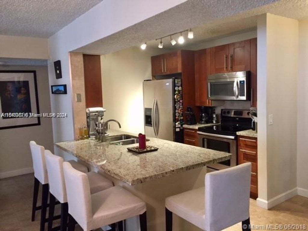 Photo of 4015 W Mcnab Rd #D105, Pompano Beach, FL 33069 (MLS # A11642367)