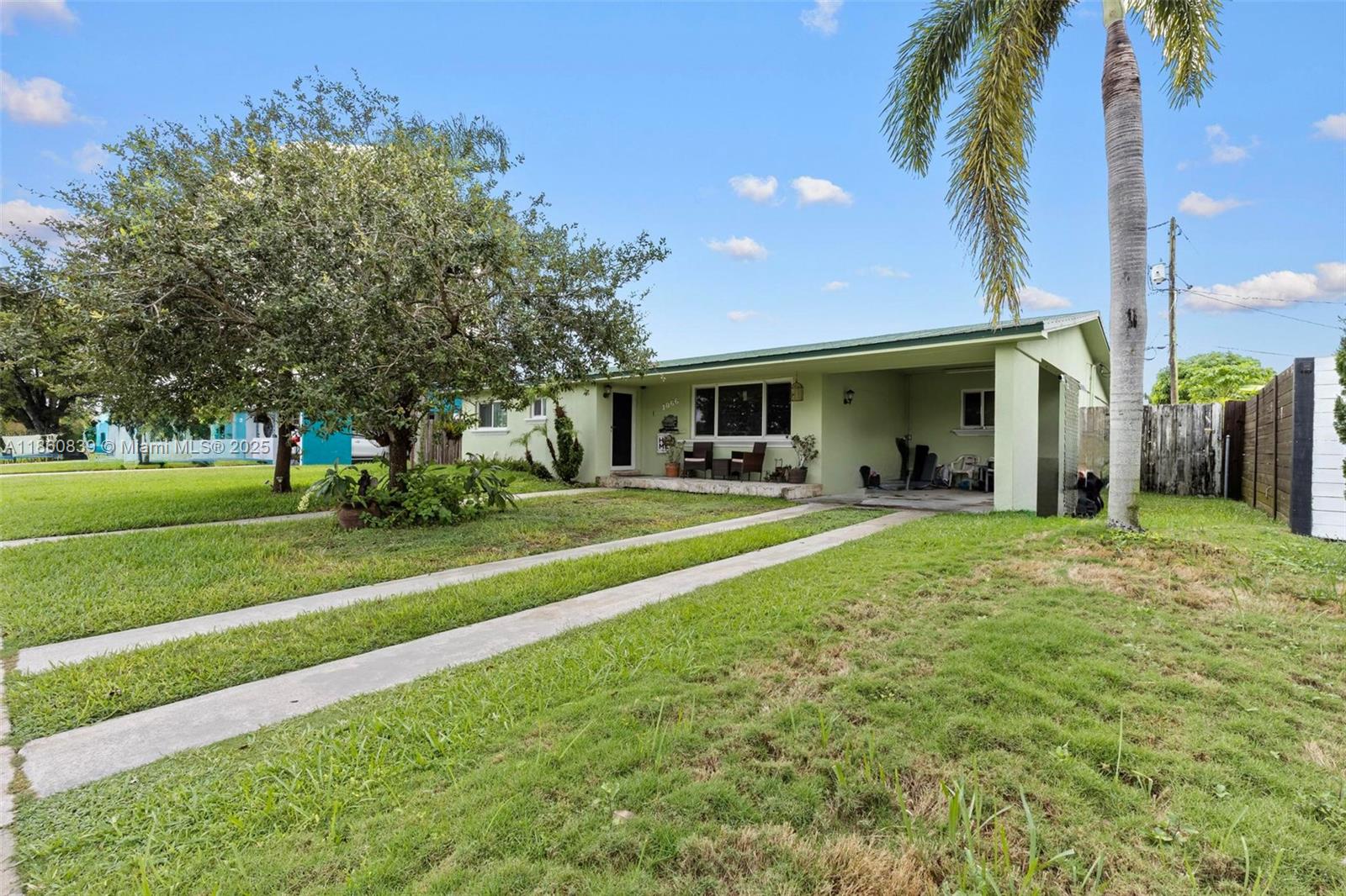 Located in a quiet Homestead neighborhood, this charming 3-bedroom, 2-bathroom home offers 1,698 sq ft of gross living area on a 7,500 sq ft lot with endless potential. Features include a new metal roof (2020), impact glass windows and doors, Samsung refrigerator, stove, and dishwasher (1.5 years old), water heater and A/C units (under 4 years old), and a remodeled master bathroom (1.5 years ago). The kitchen is upgraded with quartz countertops. Additional highlights include a one-car carport and ample space to expand, add a pool or entertainment area, or park an RV or boat.